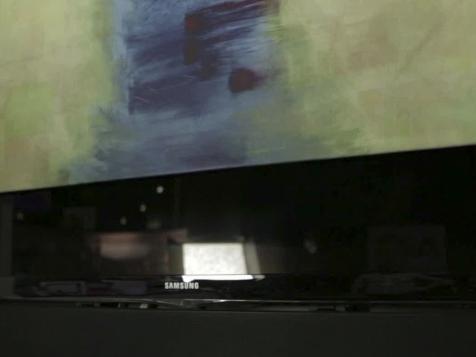 Wall Art Hides Flat-Screen TV